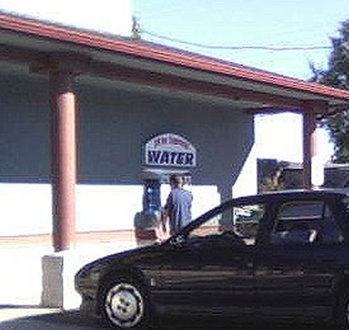 getting water from the vending machine